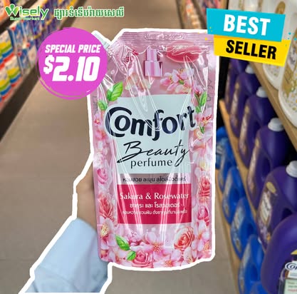 490ml។（衣物柔顺剂）ទឹកក្រអូបបោកសម្លៀកបំពាក់ Comfort Beauty Perfume ក្លិនផ្កាសាគូរ៉ា និងទឹកផ្កាកុលាប ដែលផ្តល់នូវក្លិនក្រអូបប្រណិតជាប់បានយូរ និងធ្វើឱ្យសាច់ក្រណាត់ទន់ល្មើយ។